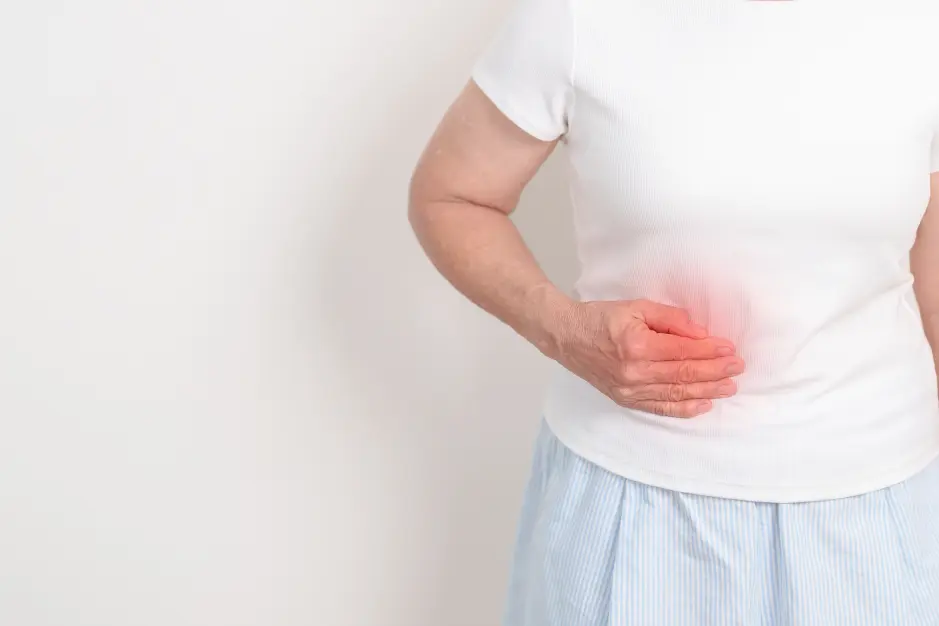 A woman experiencing pancreatitis